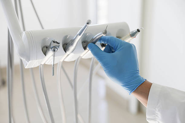 Professional Emergency Dentist technician working in Ten Mile Run, NJ